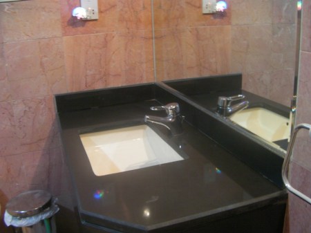 BathSink bathroom sink with black marble counter