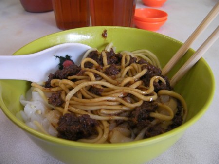bowl of beef, rice noodles and egg noodles