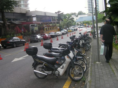 row of parked motorcycles