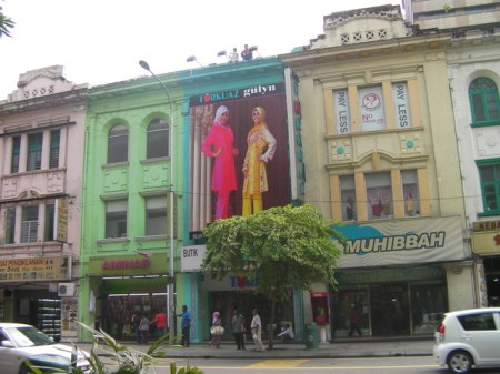 large billboard with muslim models