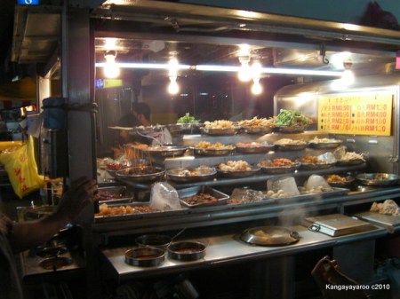 cart full of foods on skewers