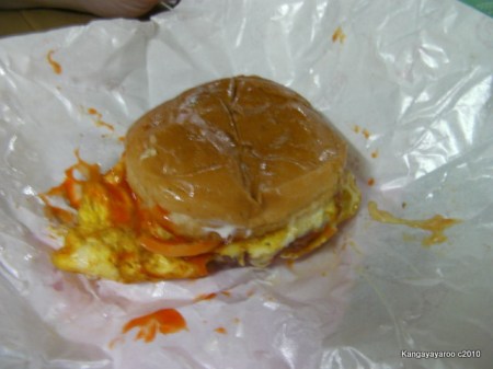 burger with egg and cheese on the bun