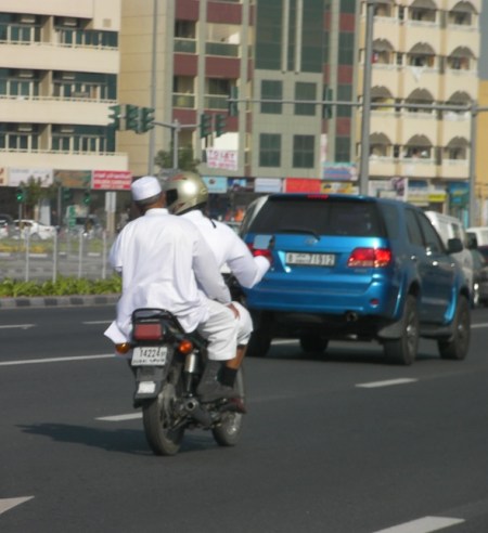 Cycle two men on a motorcycle
