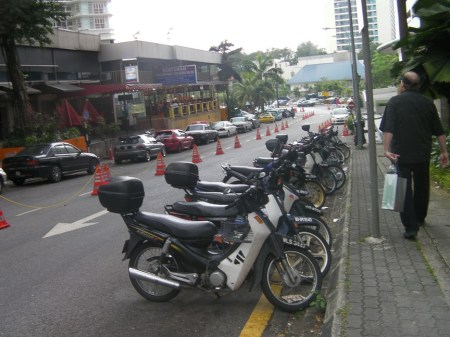 row of parked motorcycles