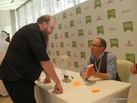 Chris Cleave, author, signing a book