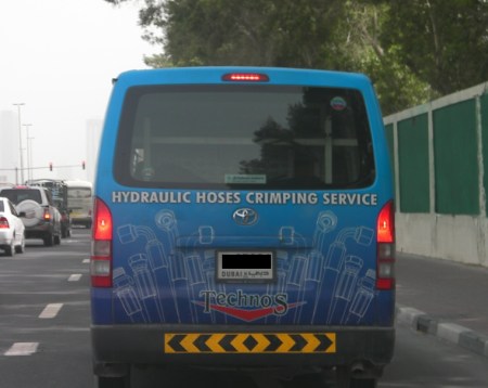 van advertising a hose crimping service