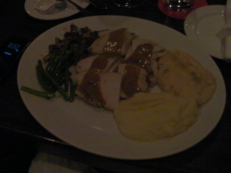 Thanksgiving dinner green beans, mushrooms, turkey breast, mashed potatoes