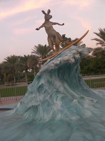 sculpture of a kangaroo surfing