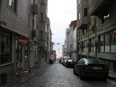 view down a cobblestone street to the sea of MarMara 