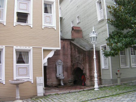 new houses and old brick structure