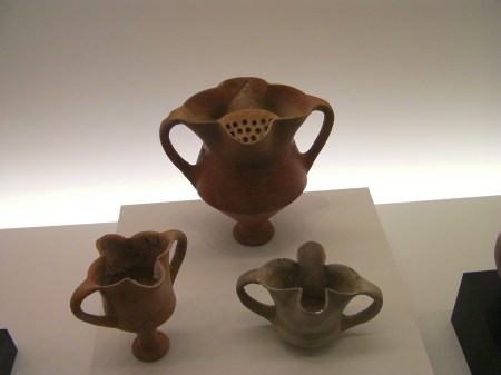 clay pitcher with built in strainer