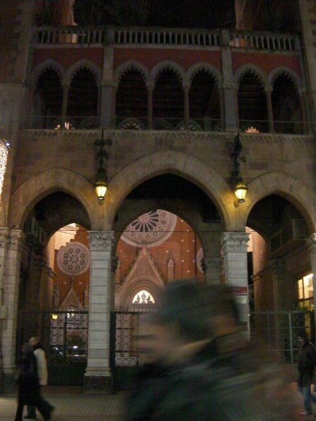 St. Antoines Church glimpsed through an arched gateway