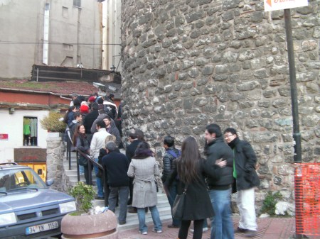 Queue at the Tower long line of people waiting to go into the tower