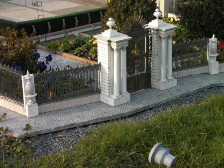 iron work fence with large ornate fence