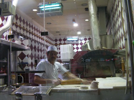 baker with brick oven