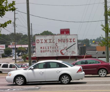 sign for Dixie Music and Military Supplies