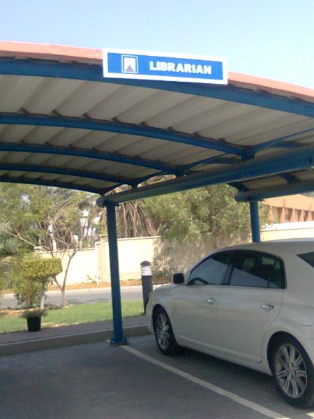 Parking Space covered parking labeled "librarian"