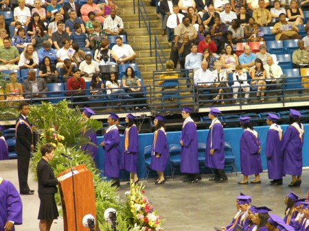 Graduates In Line graduates standing in line for diplomas