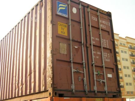 Freight Container freight container with a sign "caution nine feet six inches high"