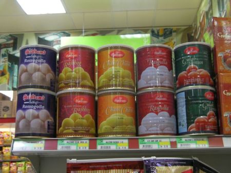 cans of five different dough ball foods