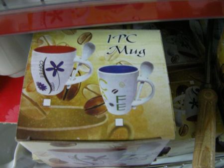 coffee mug that includes a spoon