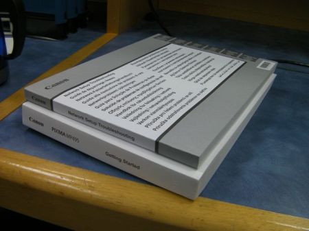 two thick printer manuals