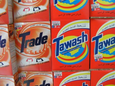 laundry detergent boxes resembling Tide 