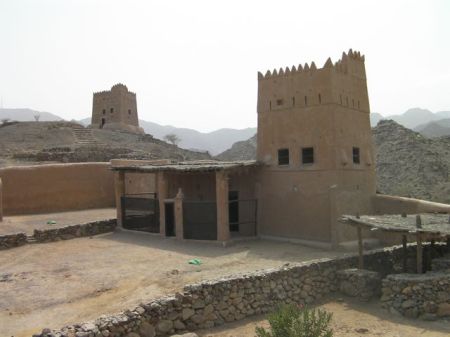 small three story tower and courtyard 