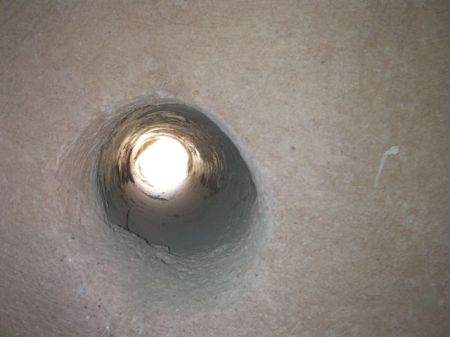 arrow hole in a wall
