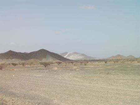 Oman mountain and stone quarry in distance