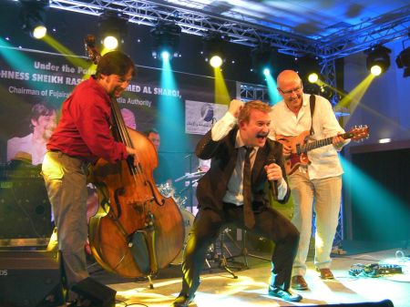 Johnny Rogers Band 3 four member jazz band on stage