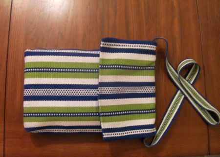 blue/green/white striped carry bag 