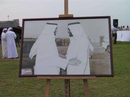 Historical Pictures easel displaying a picture of two men