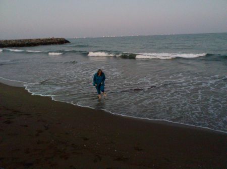 me wading in the surf