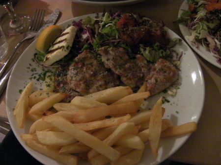 french fries, tenderloin, baked tomato, grilled feta cheese, green salad