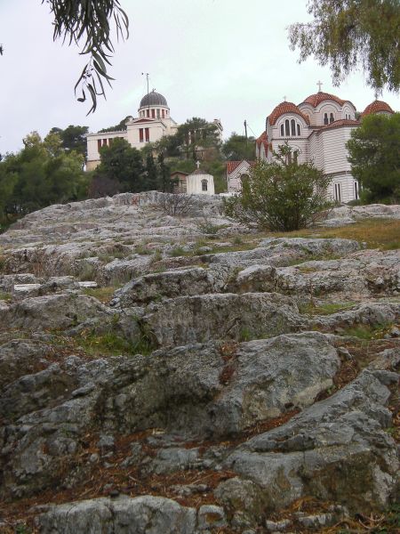 Sanctuary of Zeus hillside ancient ruins, churches in background