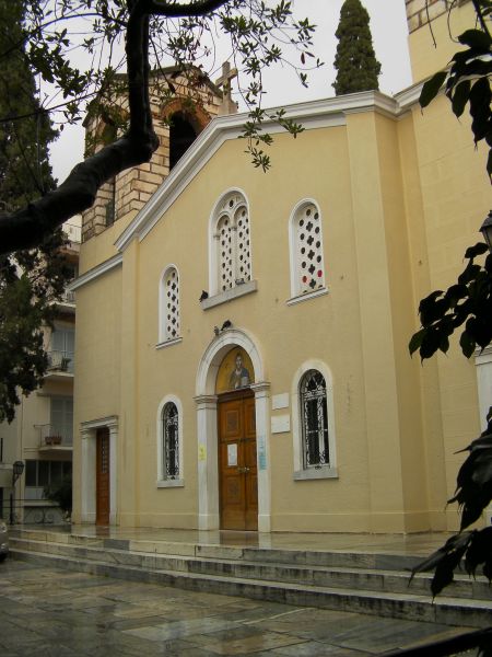 yellow plaster sided church