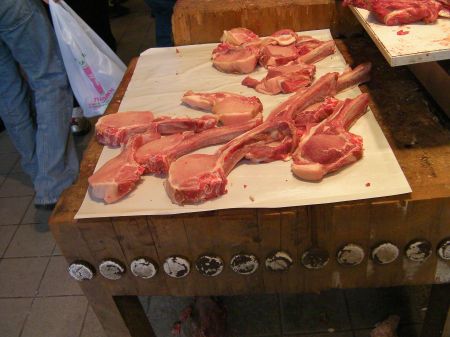 butcher block full of large pork chops
