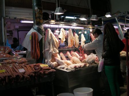 showcase of pigs feet, intestines, stomach, and other organs
