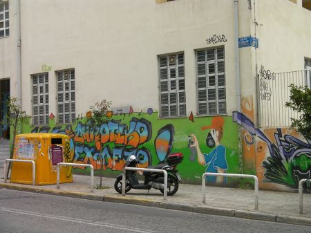 Street Art in Athens graffiti depicting the artist in action