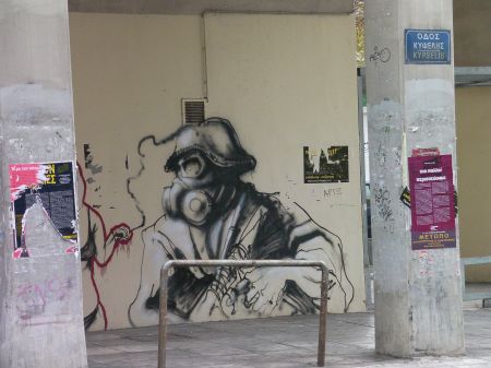 Street Art in Athens graffiti of military or riot policeman in full gear