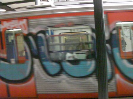 Graffiti on the Metro Train graffiti on the side of a train