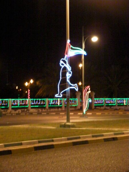 Boy with Flag light post decor shaped like a boy carrying a flag