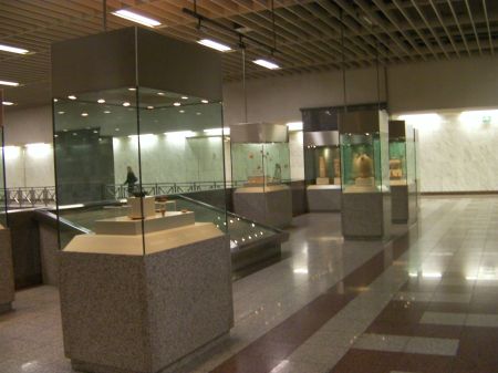 glass cases containing artifacts and pottery