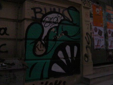 graffiti of a green monster saying argh