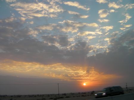 sun shining through clouds