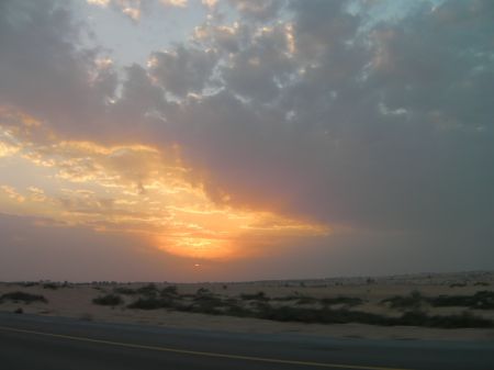 sun shining through clouds