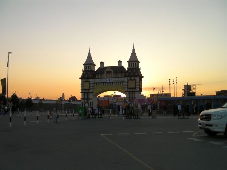 Sunset at Global Village sun setting behind the entrance gate