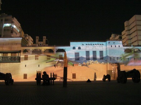 Falcon Eye View desert scene projected on the side of the fort