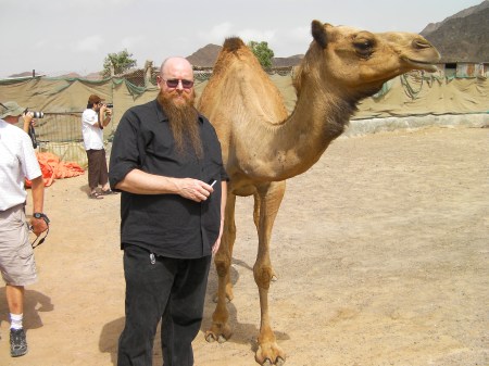 DaddyBird and Camel man posing with a camel